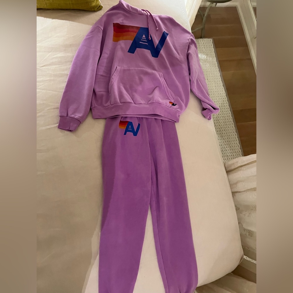 lightly worn purple aviator nation set